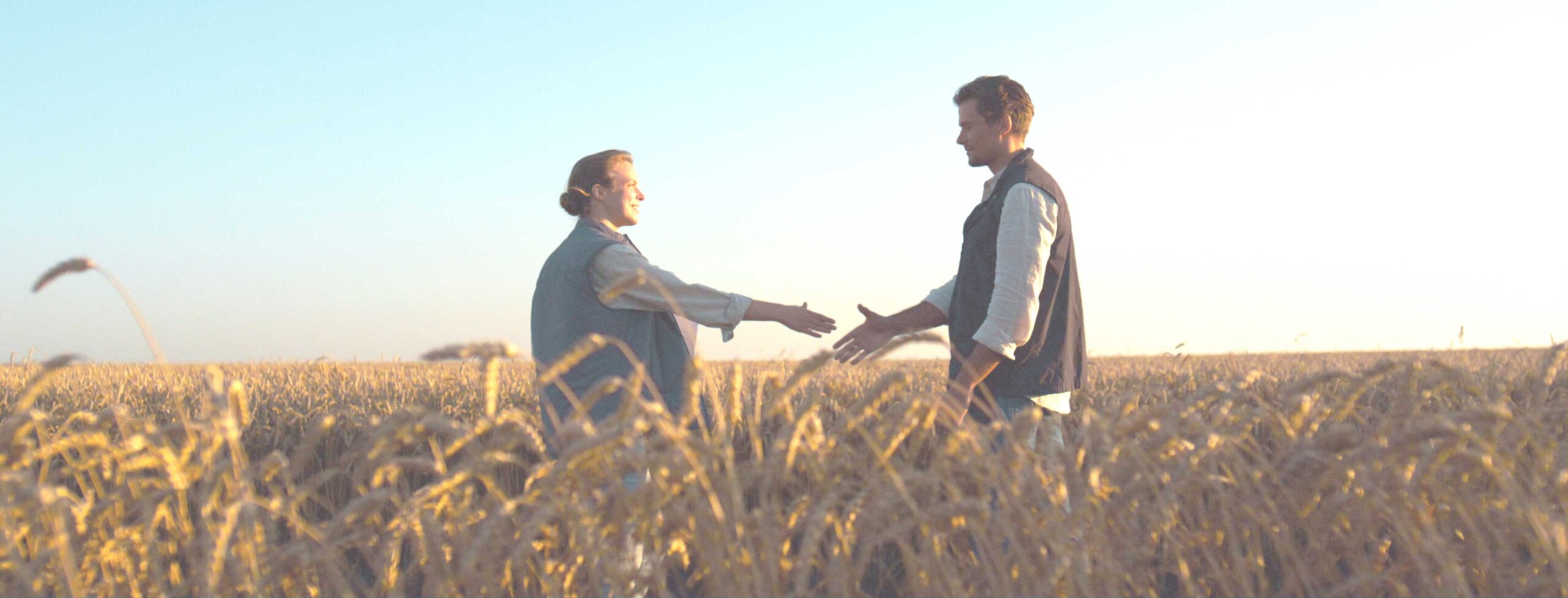 Man and Woman shaking hands after doing banking business